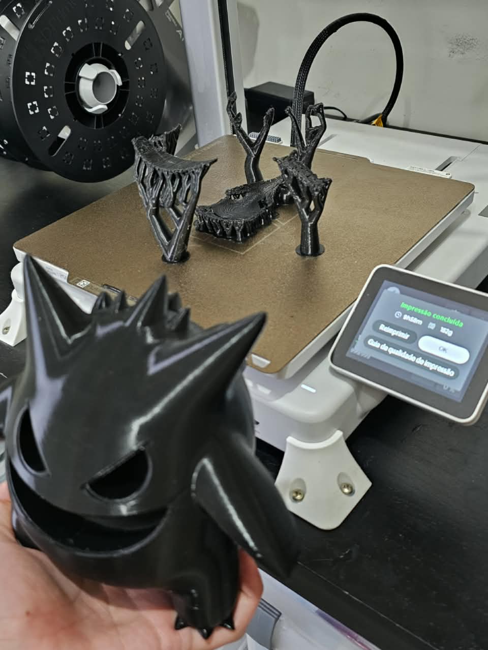 Peças saindo da impressora 3D